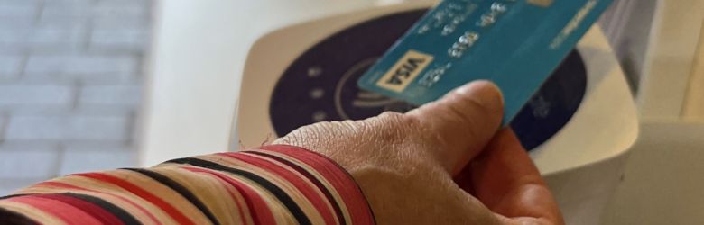 Giving contactless machine in use in Street church