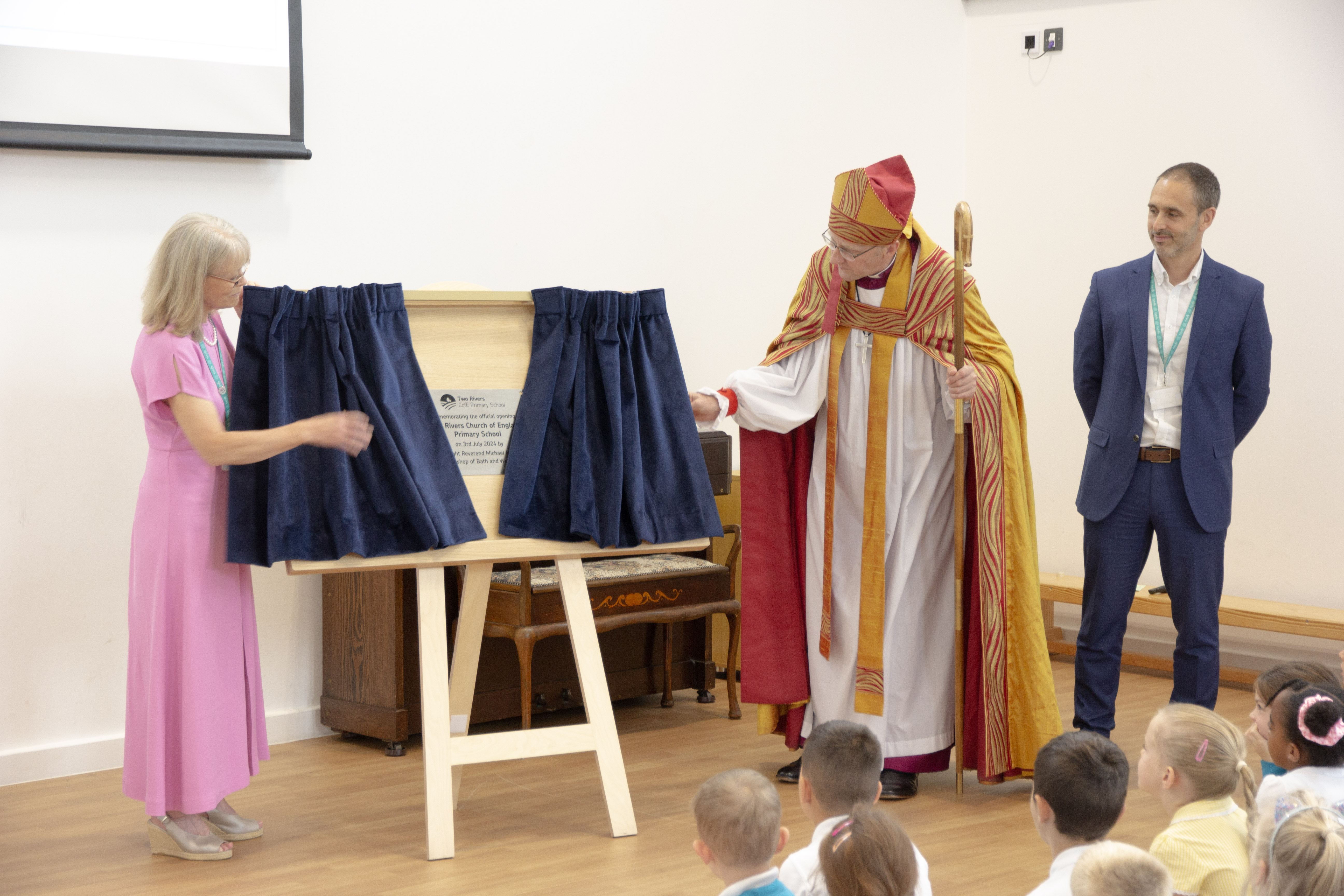 Bishop unveiling Two Rivers School Plaque
