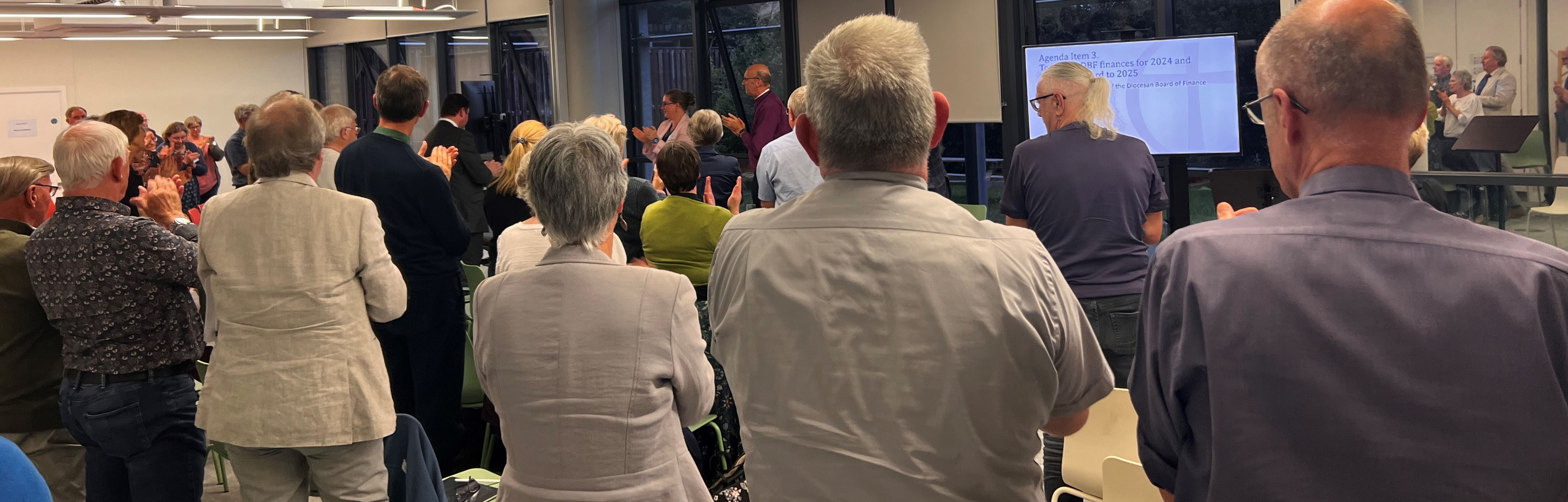Diocesan Synod Banner Ian Theodoreson standing ovation
