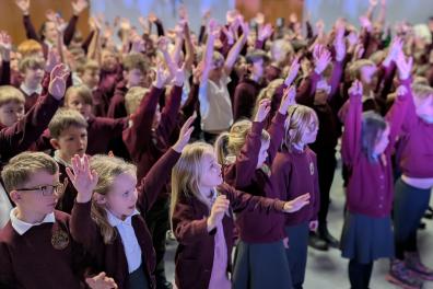 St Mary's schoolchildren singing Midnight.jpg