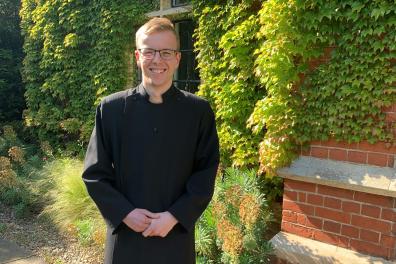 S Thompson - Headshot - Cassock.jpg