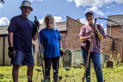 scything at St James's Church, Taunton