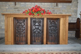 Middlezoy Church recycled pew ends on altar