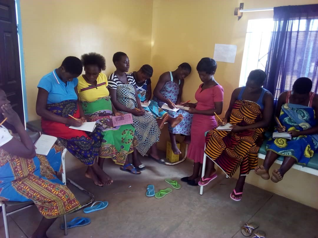 Literacy lessons for the Waiters at Katate Hospital