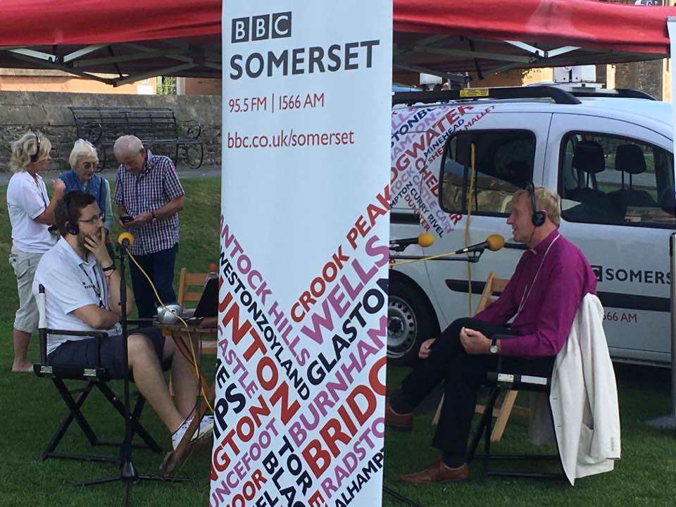 Bishop Peter with BBC Somerset outside Wells Cathedral