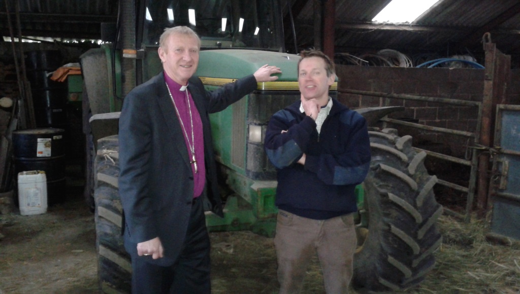 Bishop Peter with a local farmer