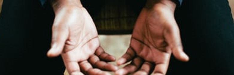 hands open in prayer