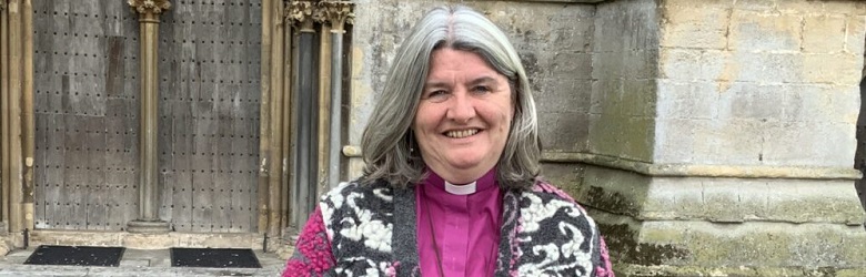 Bishop Ruth outside Wells Cathedral