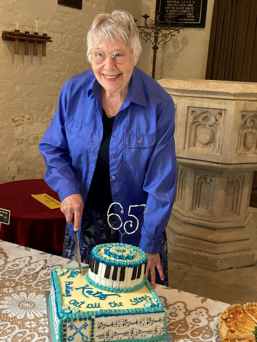 Kathleen cuts her celebratory cake