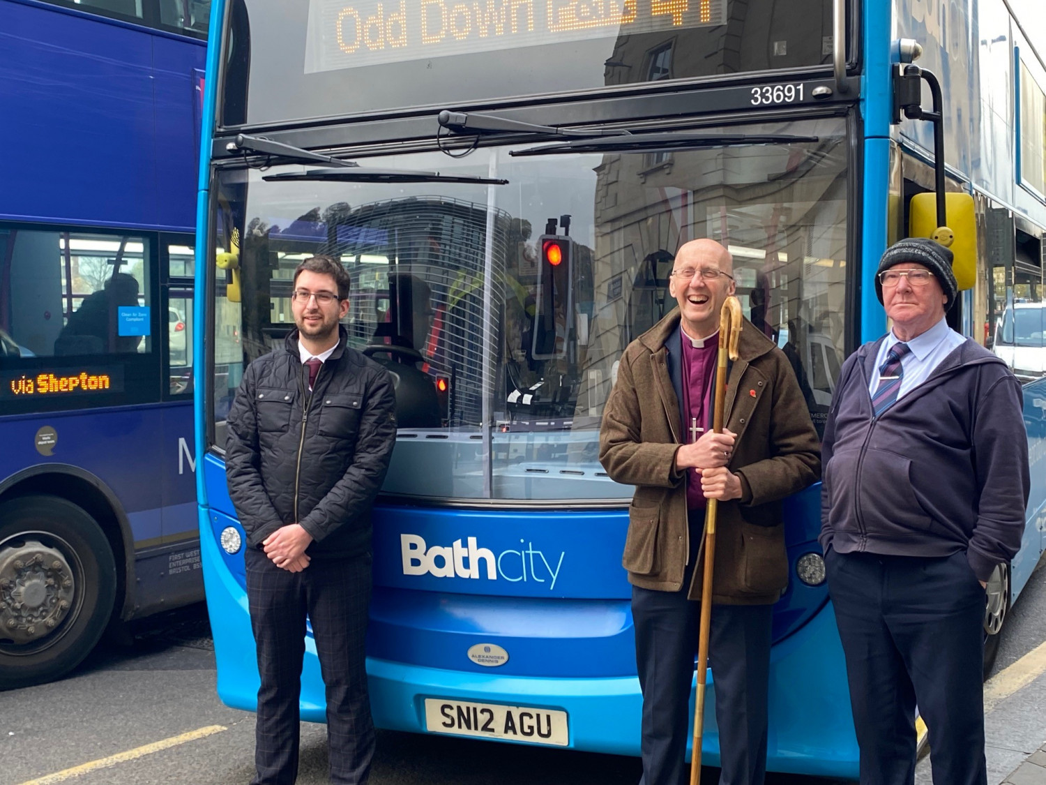 Bishop Michael with FirstBus driver Les and Ops Manager, Thomas.
